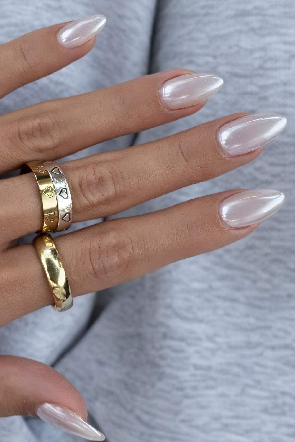 Iridescent Pearlescent Stiletto Nails Iridescent Pearlescent Stiletto Nails — Holiday Party Nails 2026