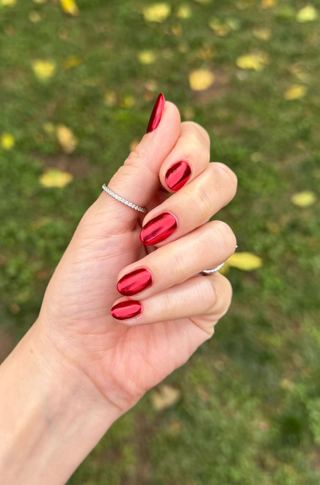 Vibrant Chrome Red Short Oval Nails — Holiday Nail Colors 2026
