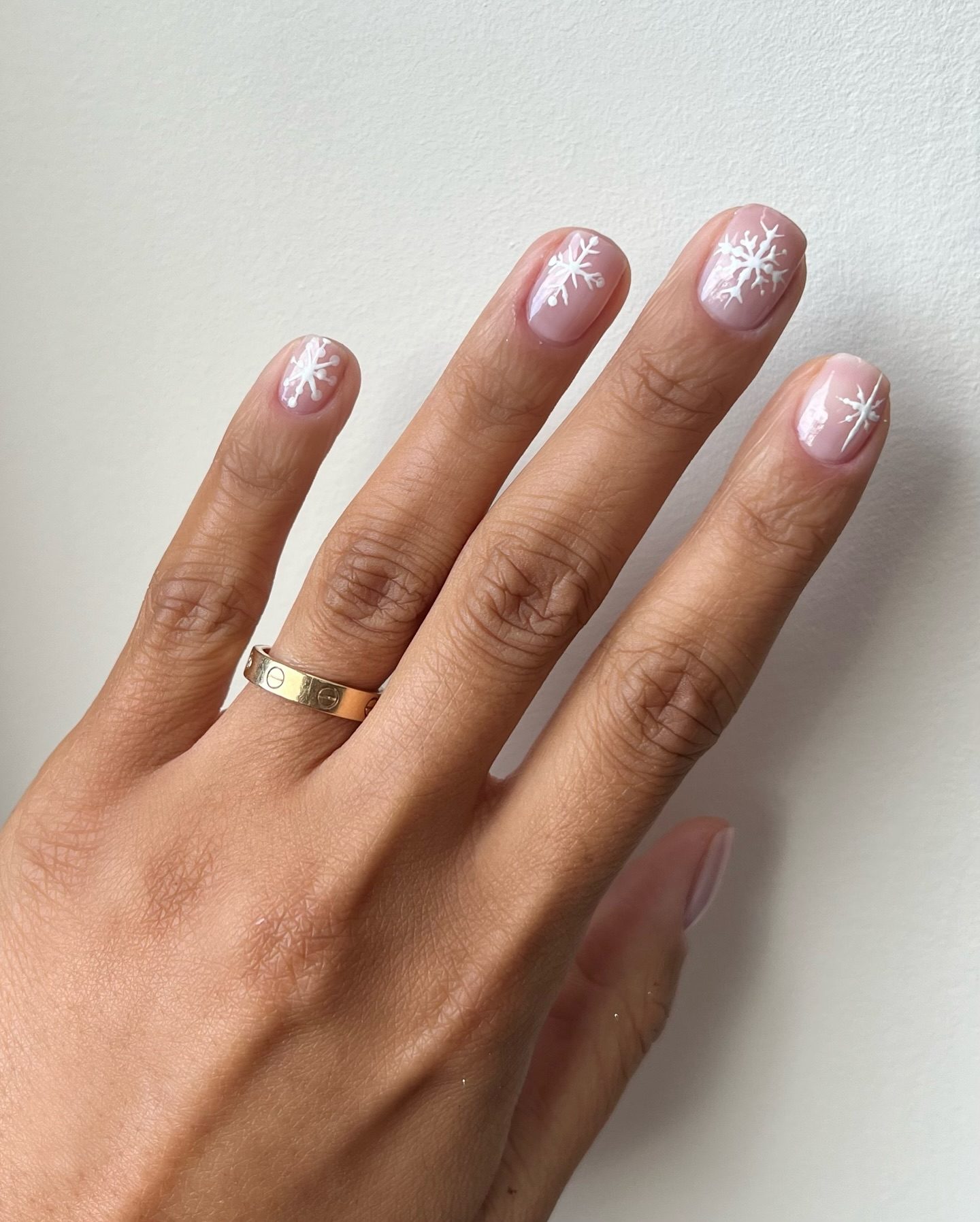 Short Oval Sheer Pink Snowflake Decals Short Oval Sheer Pink Snowflake Decals — Subtle Christmas Nails 2026