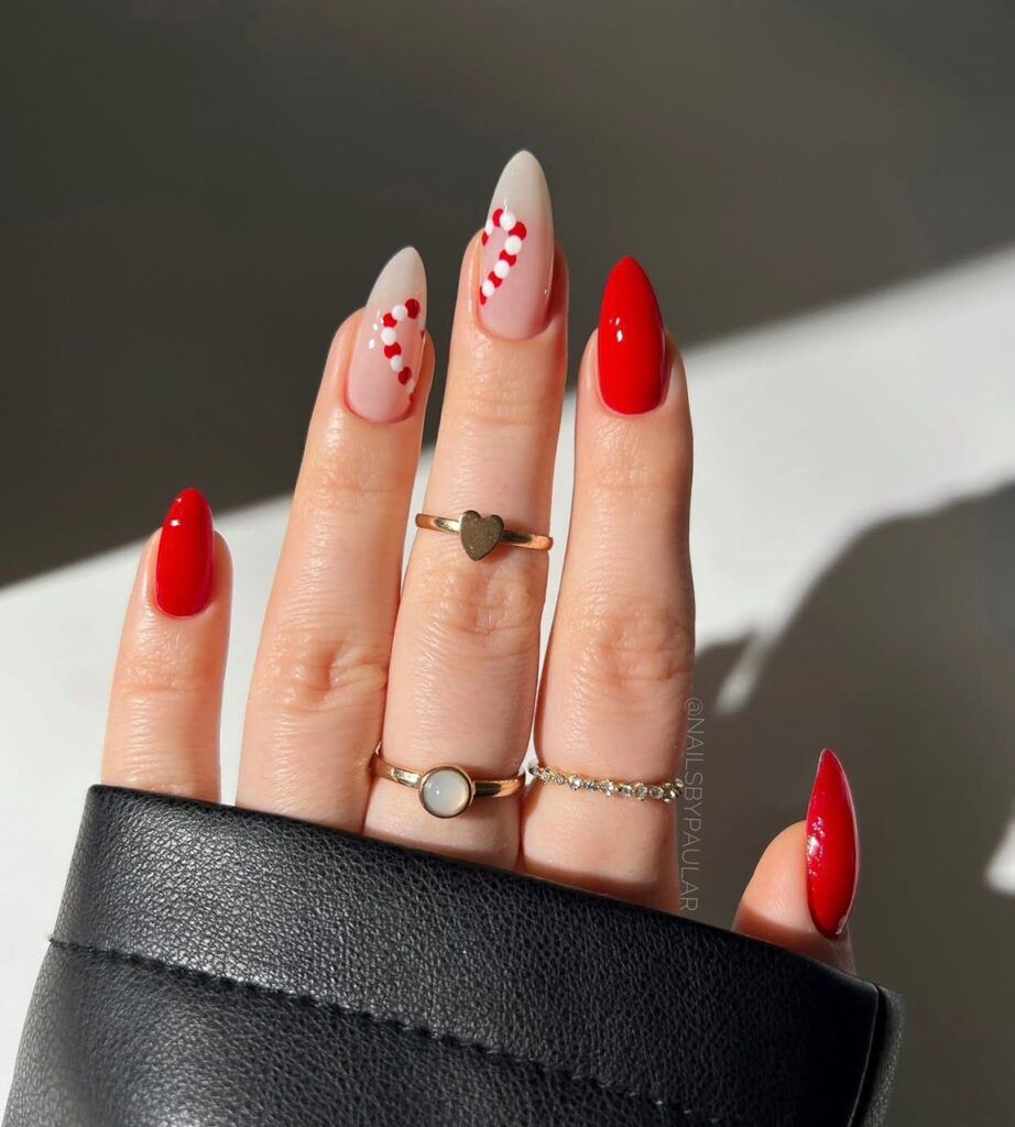 Bright Red Candy Cane French Almonds Bright Red Candy Cane French Almonds — Short Christmas Almond Nails 2026