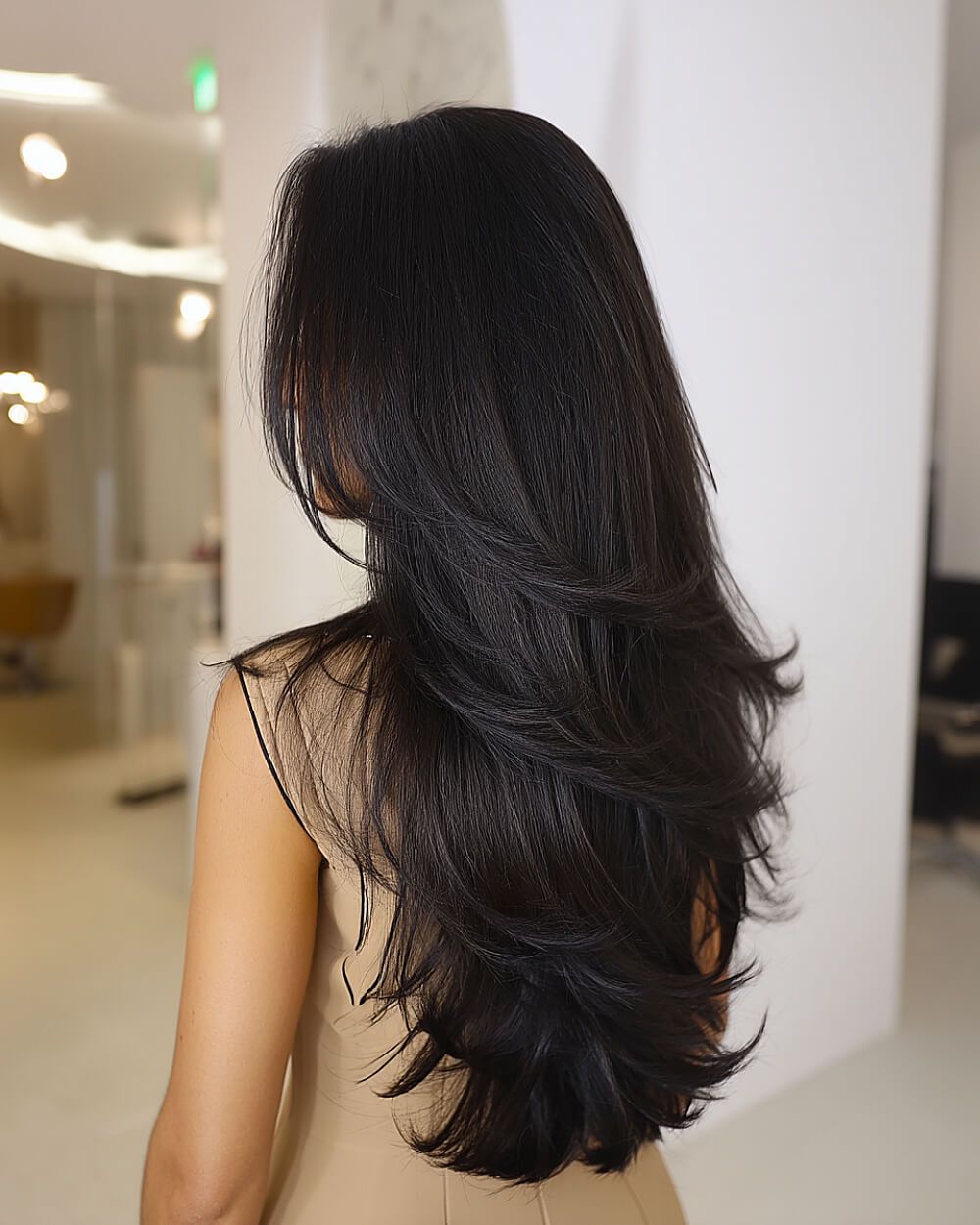 Mid-Back Feathered Layers with Bangs — Winter Haircuts for Straight Hair