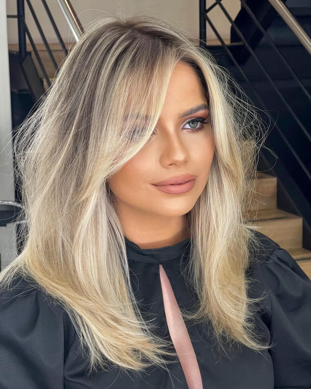 Layered Bob With Side-Swept Bangs — Winter Haircuts for Square Faces