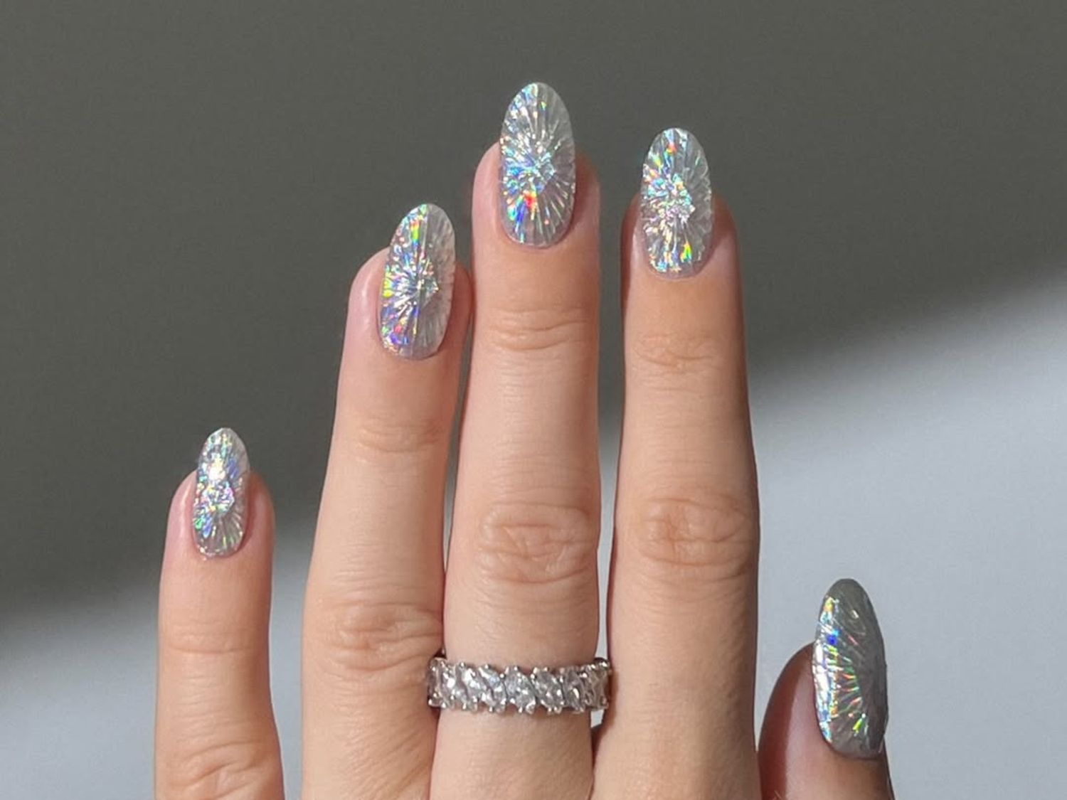 Radiating Silver Holographic Foil Oval Nails Radiating Silver Holographic Foil Oval Nails — Minimalist New Years Nails 2027