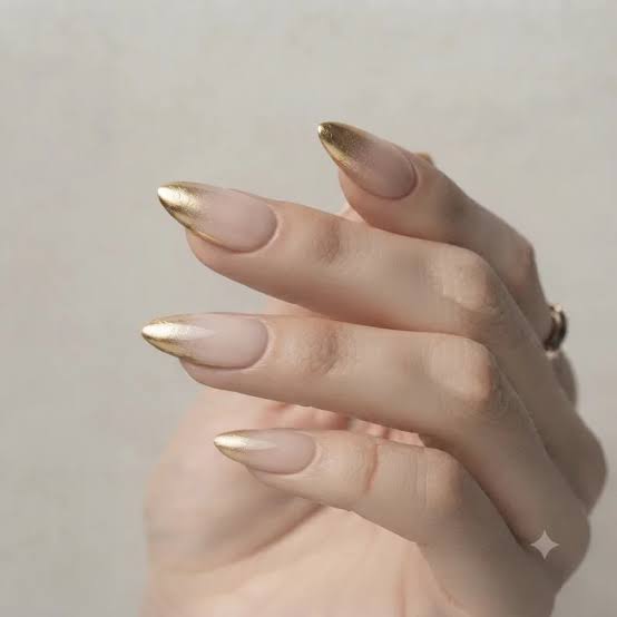 Metallic Gold French Tips on Nude Stilettos Metallic Gold French Tips on Nude Stilettos — New Years Stiletto Nails 2027