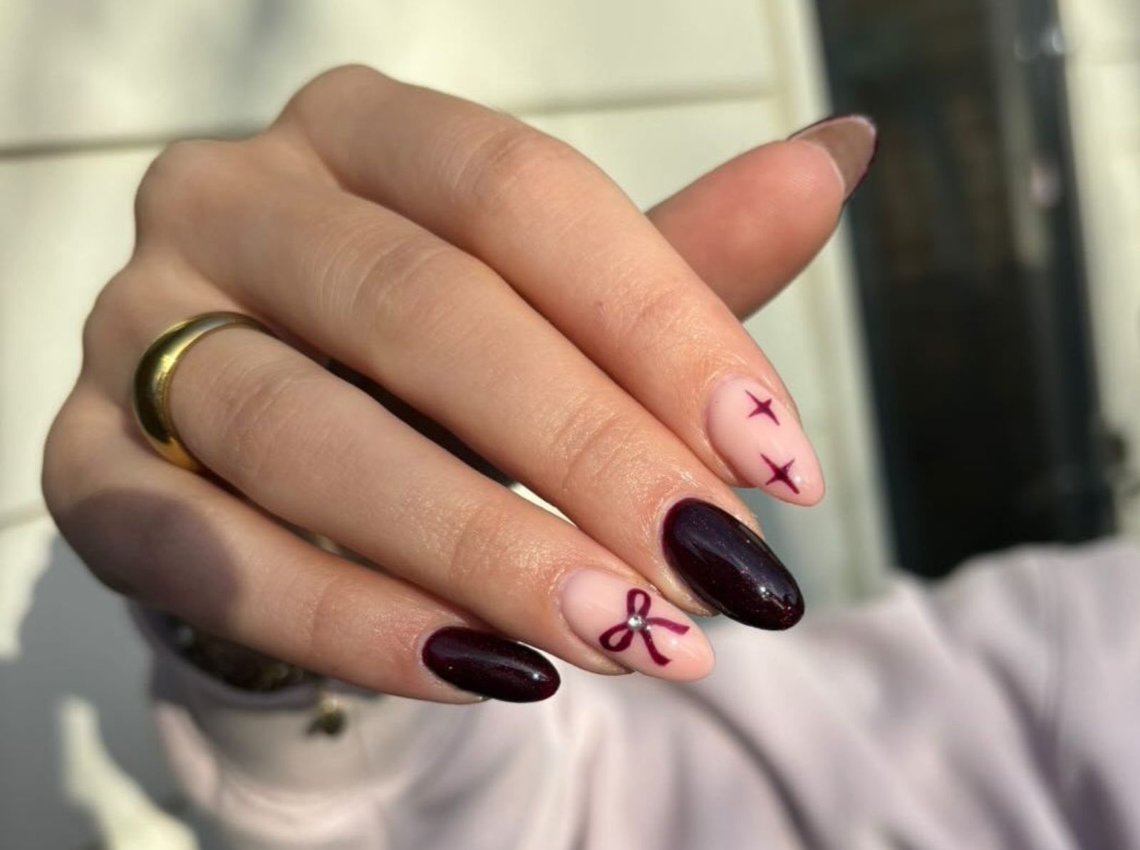 Burgundy & Pink Almond Nails with Bows & Stars Burgundy & Pink Almond Nails with Bows & Stars — Winter Date Night Nails
