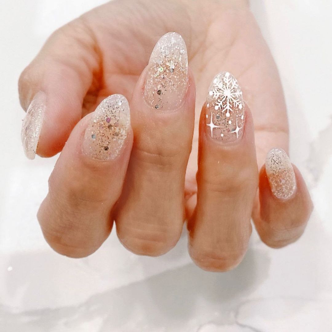 Glitter Snowflake Visual Idea Glitter Snowflake Visual Idea — Cute Christmas Nails 2026
