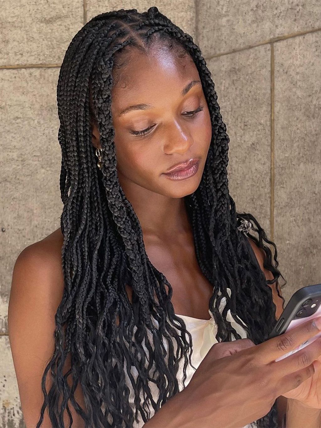 Mid-Back Flowing Box Braids With Wavy Ends Mid-Back Flowing Box Braids With Wavy Ends — Winter Braids for Black Women
