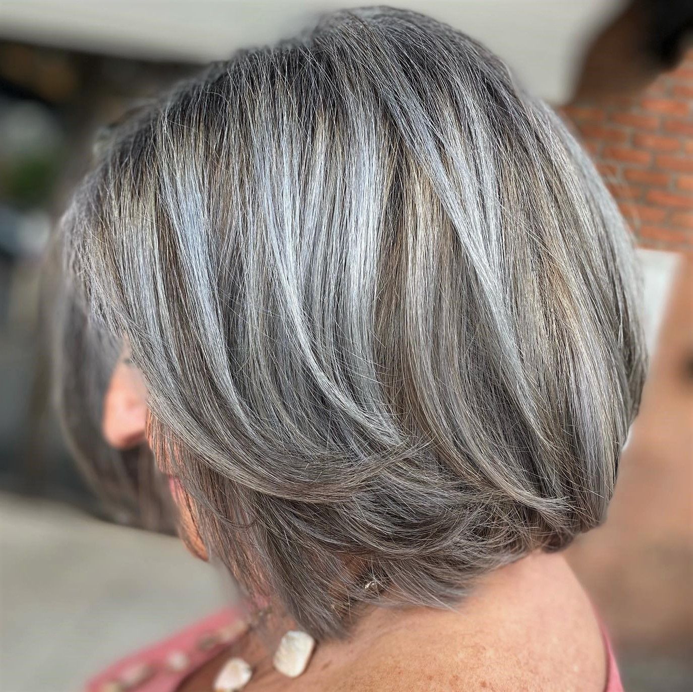 Textured Bob With Loose Gray and Silver Blend Textured Bob With Loose Gray and Silver Blend — Gray Blending Highlights