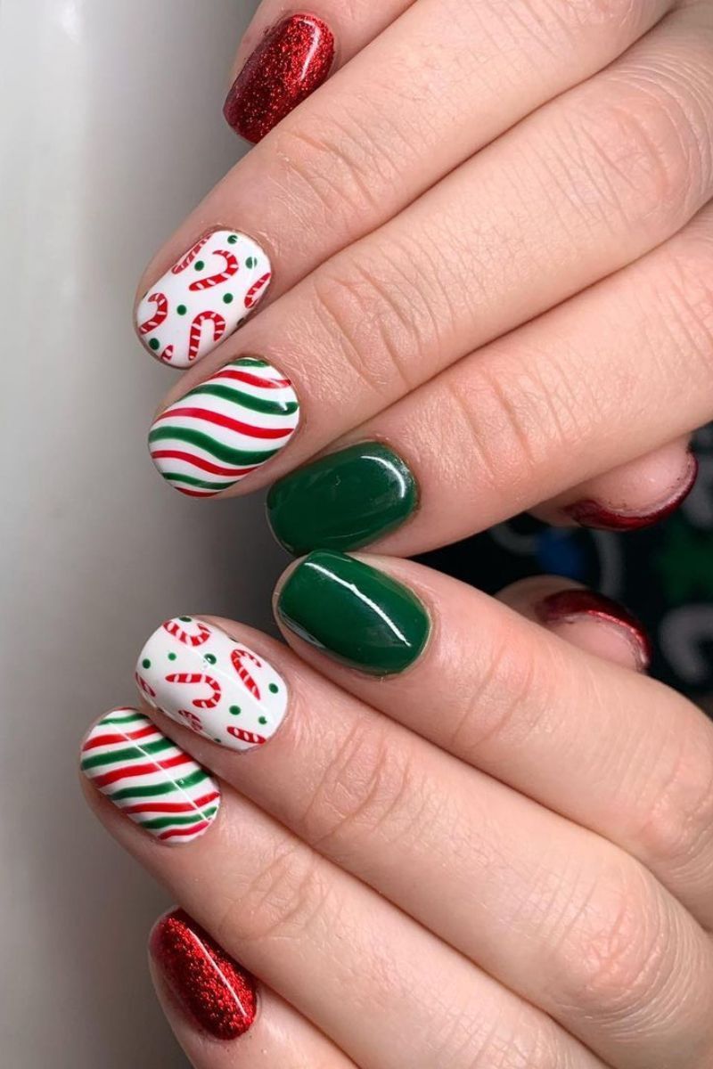 Short Oval Mixed Candy Cane Nails Short Oval Mixed Candy Cane Nails — Simple Christmas Nails 2026