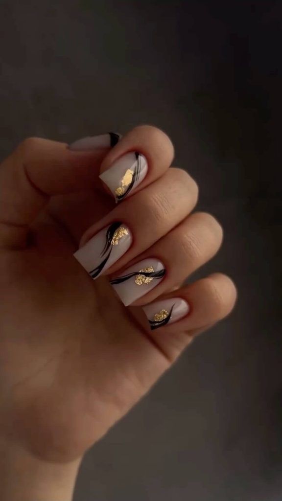 Swirls And Gold Leaf Accents Visual Idea Swirls And Gold Leaf Accents Visual Idea — Winter Nail Colors for Short Nails