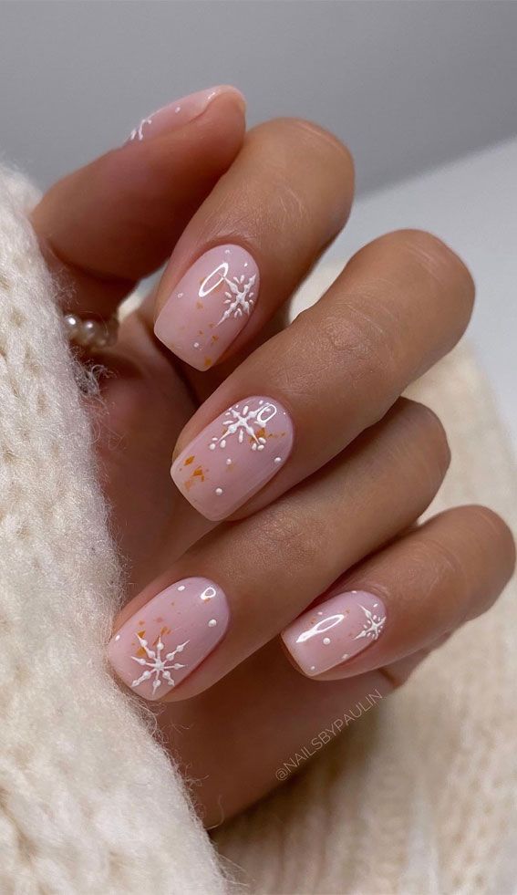 Sheer Pink with Delicate White Snowflakes Sheer Pink with Delicate White Snowflakes — Short Christmas Nails 2026