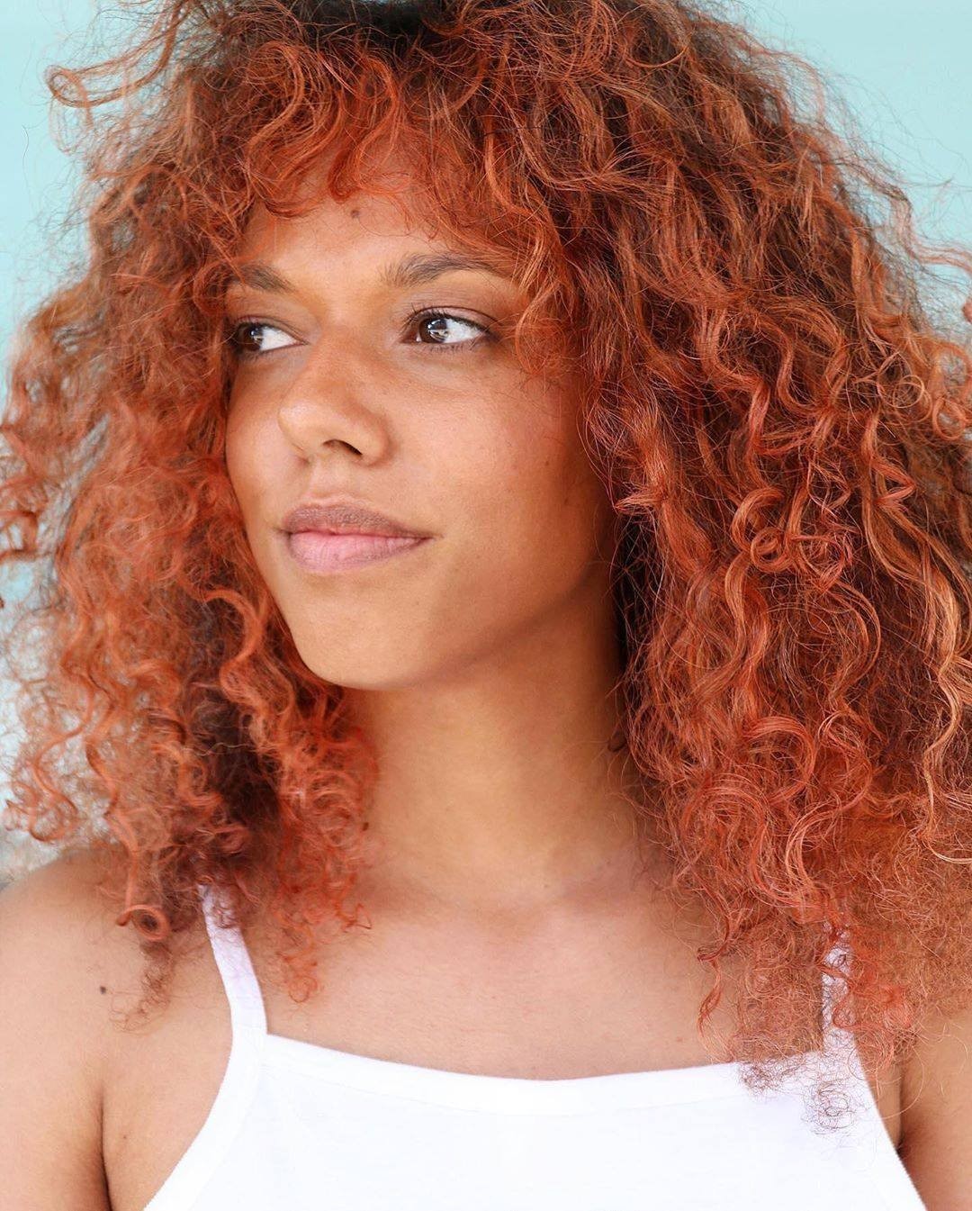 Vibrant Copper Orange Curly Shag Vibrant Copper Orange Curly Shag — Winter Hair Colors for Redheads