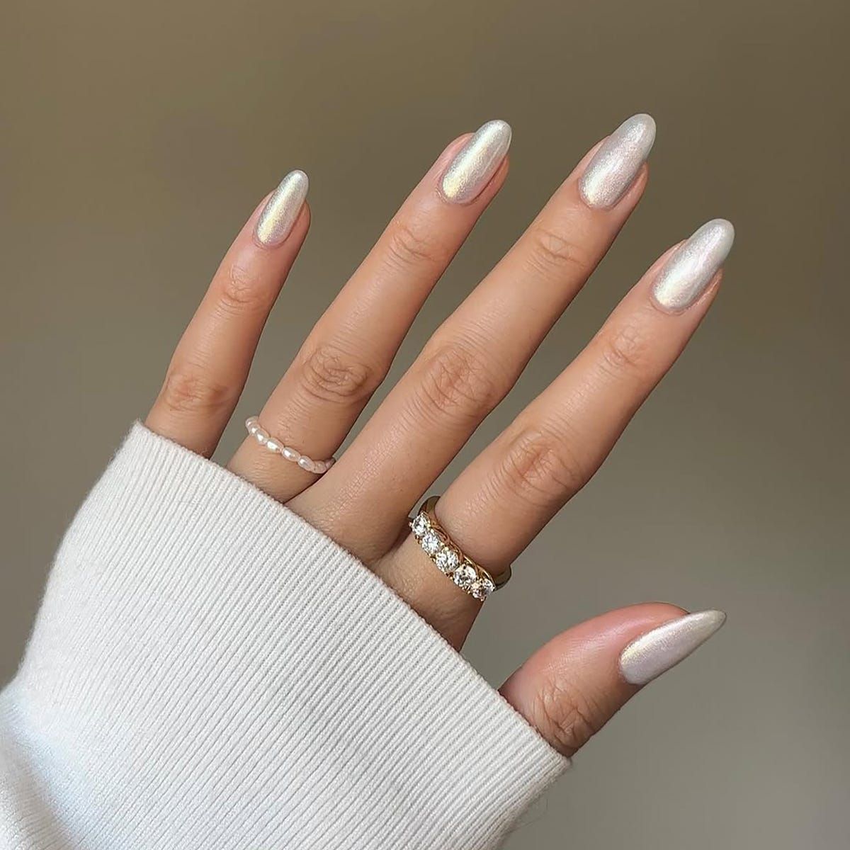 Light Pearlescent White Stiletto Nails Light Pearlescent White Stiletto Nails — Winter Pearl Nails