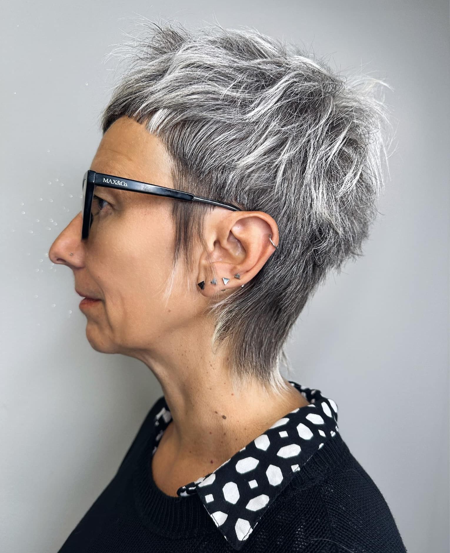 Edgy Spiky Platinum Gray Pixie Edgy Spiky Platinum Gray Pixie — Winter Haircuts for Gray Hair