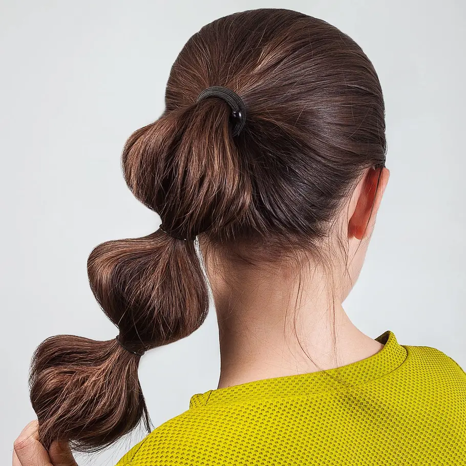 Playful Dark Brown Bubble Ponytail Playful Dark Brown Bubble Ponytail — Winter Party Hairstyles