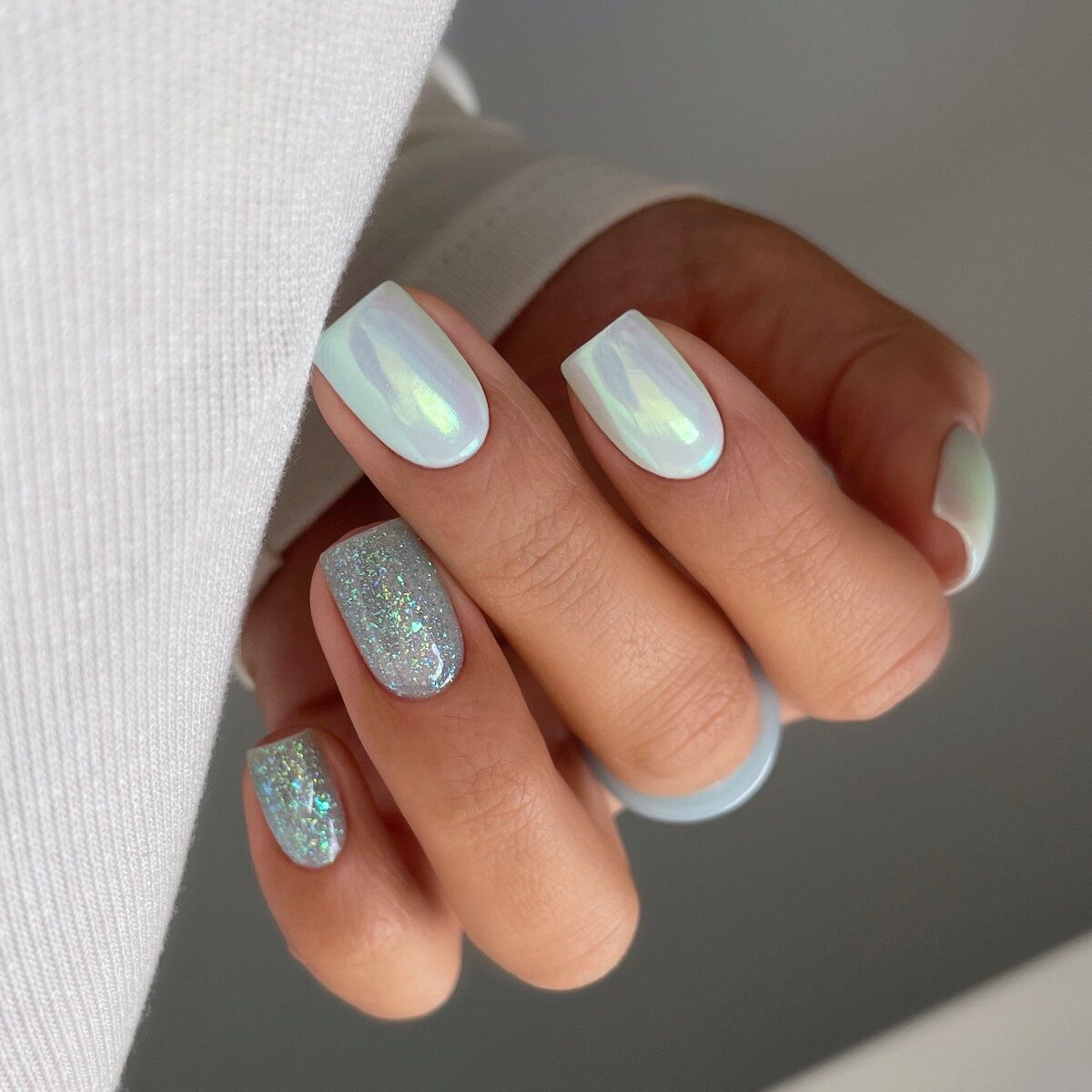 Short Oval Iridescent Chrome Short Oval Iridescent Chrome — Winter Nail Colors for Dark Skin