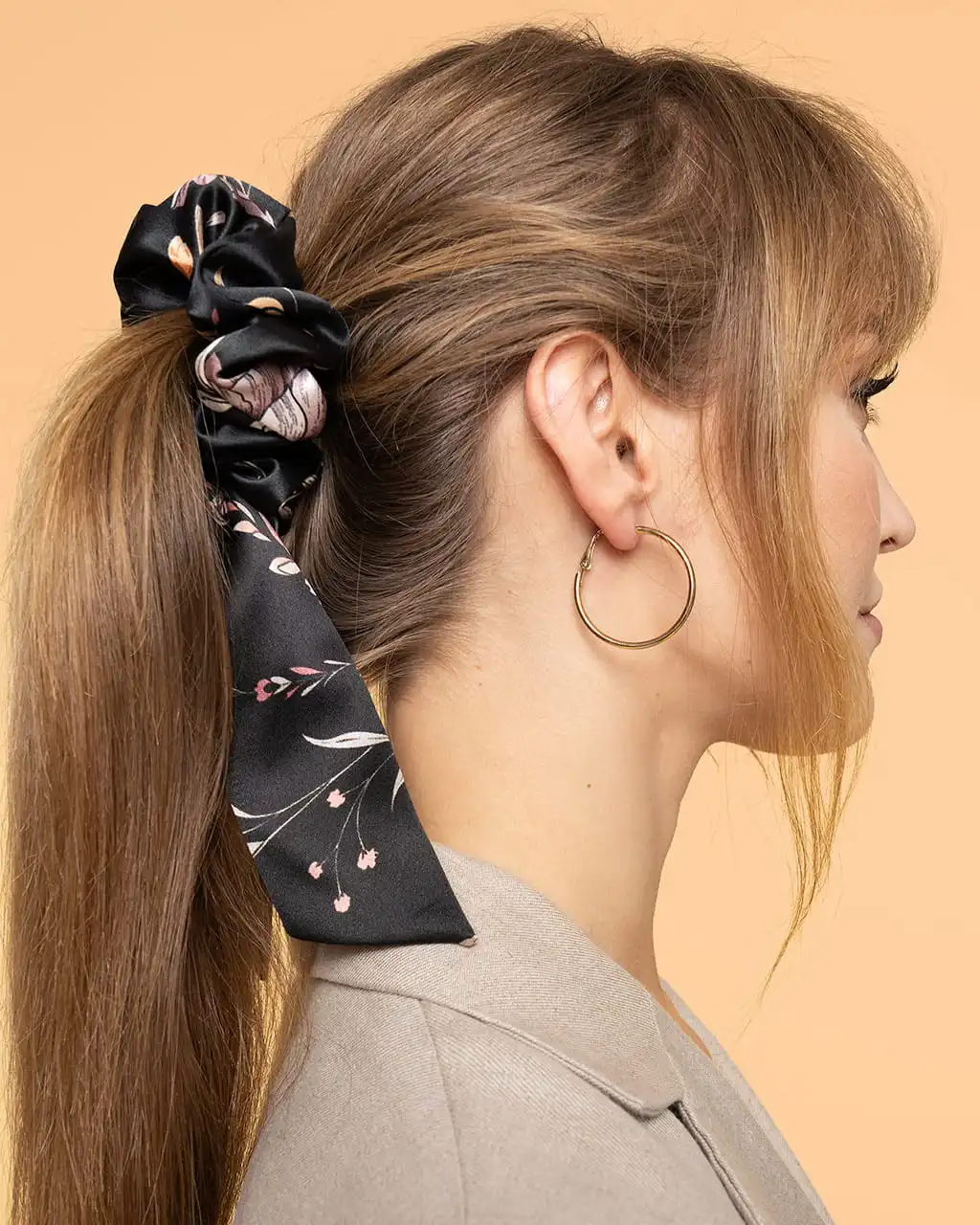 High Ponytail With A Scrunchie Accent High Ponytail With A Scrunchie Accent — Winter Date Night Hairstyles