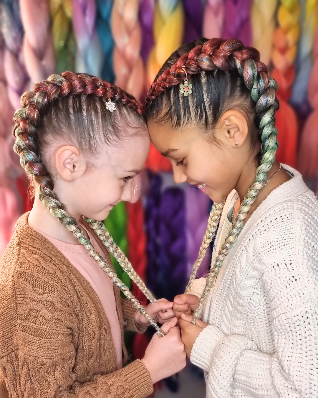 Vibrant Braided Pigtails with Charms Vibrant Braided Pigtails with Charms — Winter Hairstyles for Kids