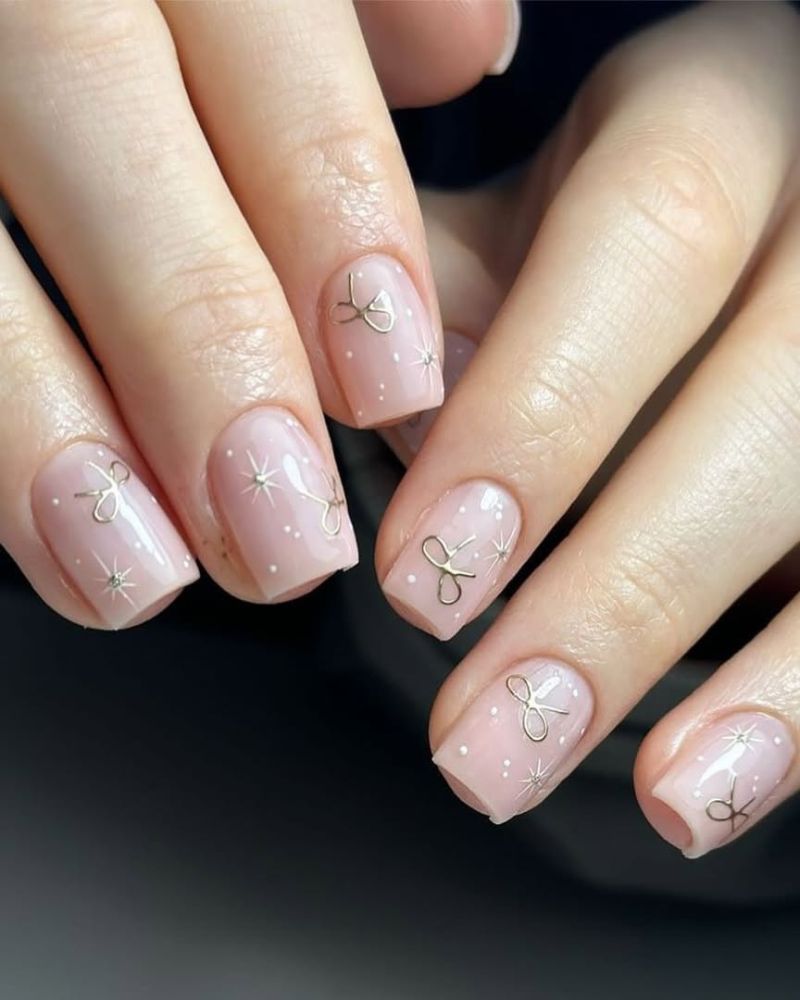 Sheer Pink with Delicate Gold Foil Bows Sheer Pink with Delicate Gold Foil Bows — Winter Bow Nails