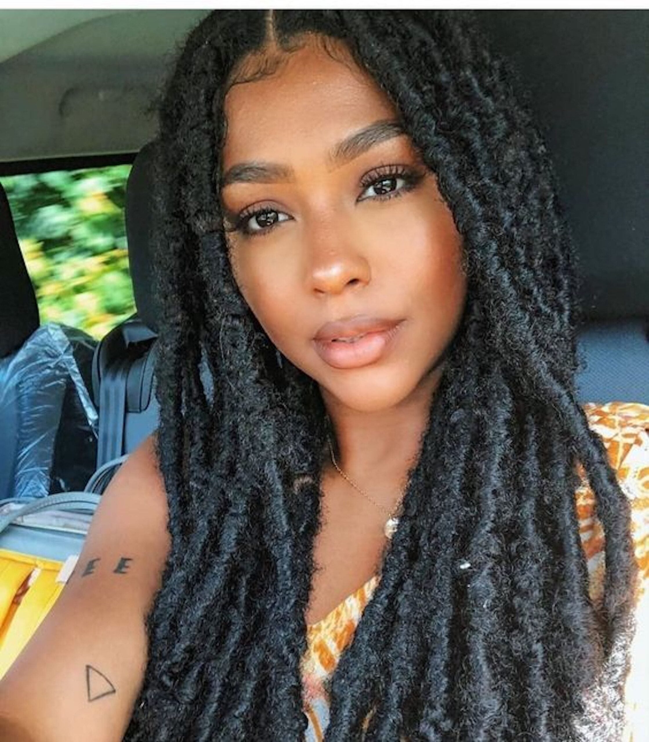 Wavy Black Faux Locs — Winter Hairstyles for Black Women
