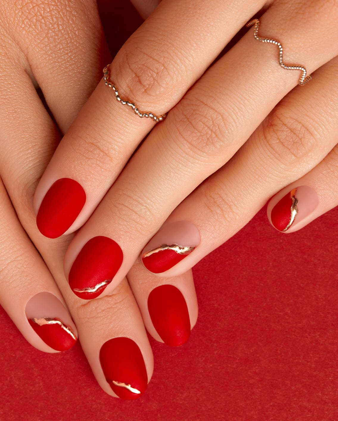 Short Oval Matte Red with Glossy Gold Stripe Short Oval Matte Red with Glossy Gold Stripe — New Years Nails 2027