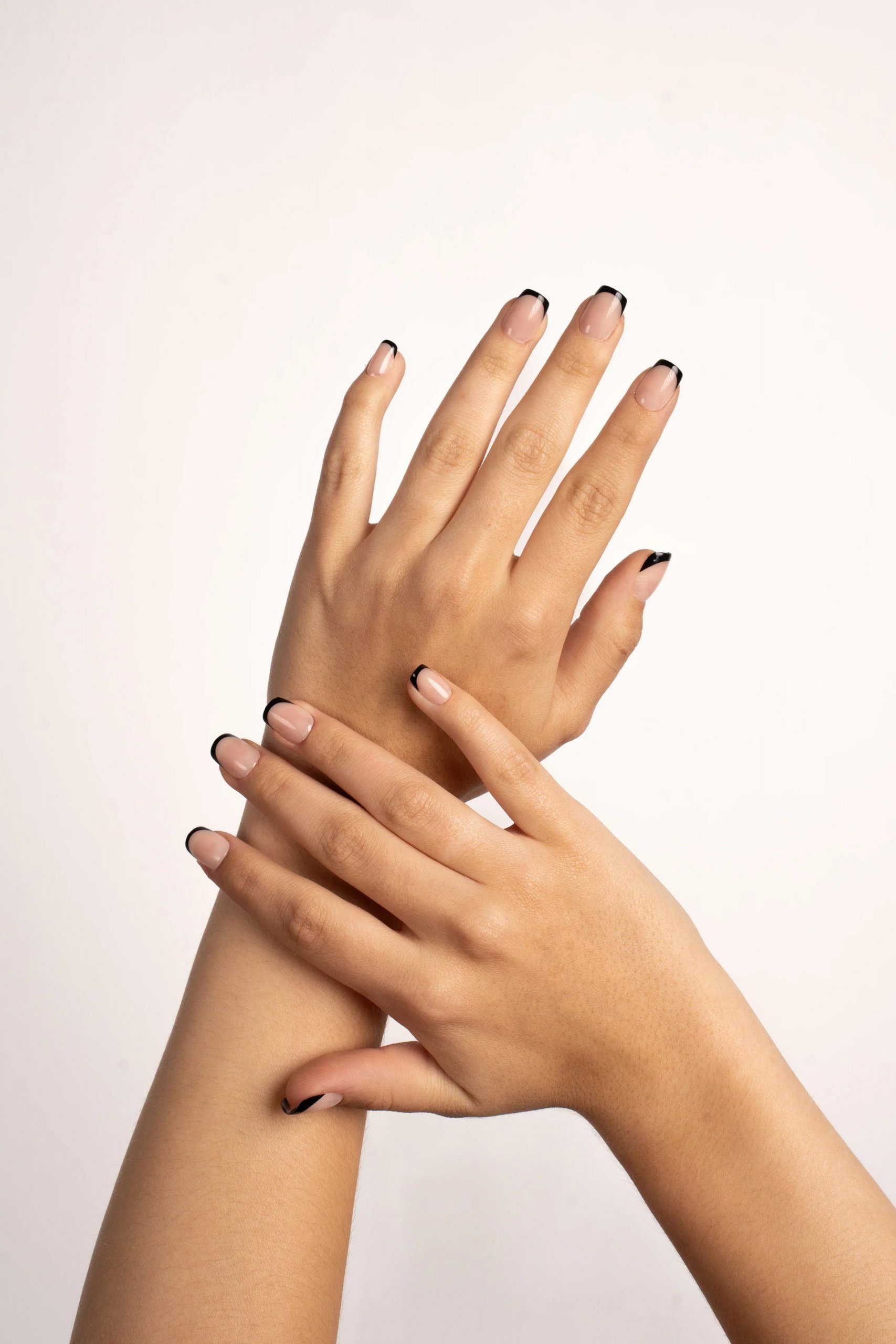 Chic Black French Tips on Sheer Nude Chic Black French Tips on Sheer Nude — Winter Nails for Black Women