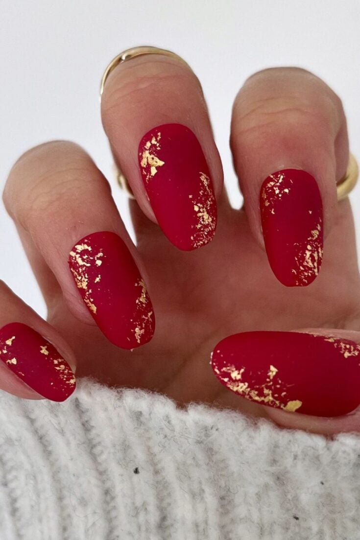 Glamorous Deep Red Stiletto with Gold Glitter Accent Glamorous Deep Red Stiletto with Gold Glitter Accent — Red and Gold Christmas Nails 2026