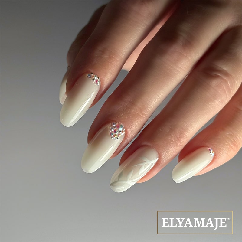 Milky White Embossed Rhinestone Nails Milky White Embossed Rhinestone Nails — Winter Wedding Nails