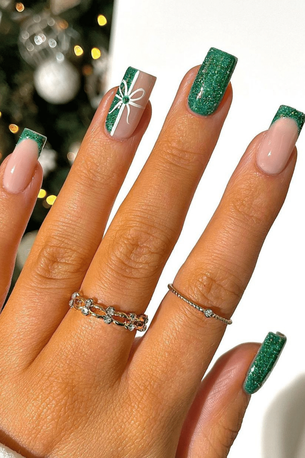 Pink with Green Glitter Tips and White Bow Pink with Green Glitter Tips and White Bow — Short Christmas Nails 2026