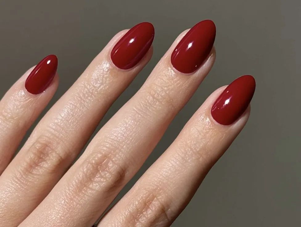 Deep Glossy Red Ovals — Simple New Years Nails 2027