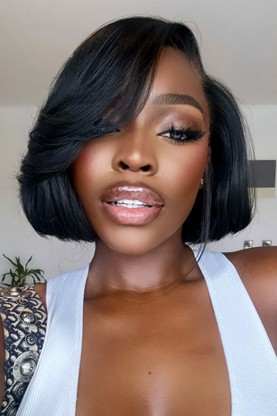 Sleek Bob With Voluminous Fringe Sleek Bob With Voluminous Fringe — Winter Haircuts for Black Women