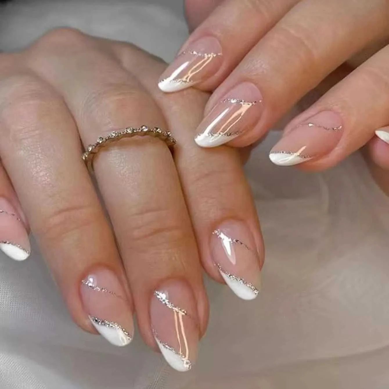Sheer Pink French With Silver Glitter Sheer Pink French With Silver Glitter — Medium Winter Almond Nails