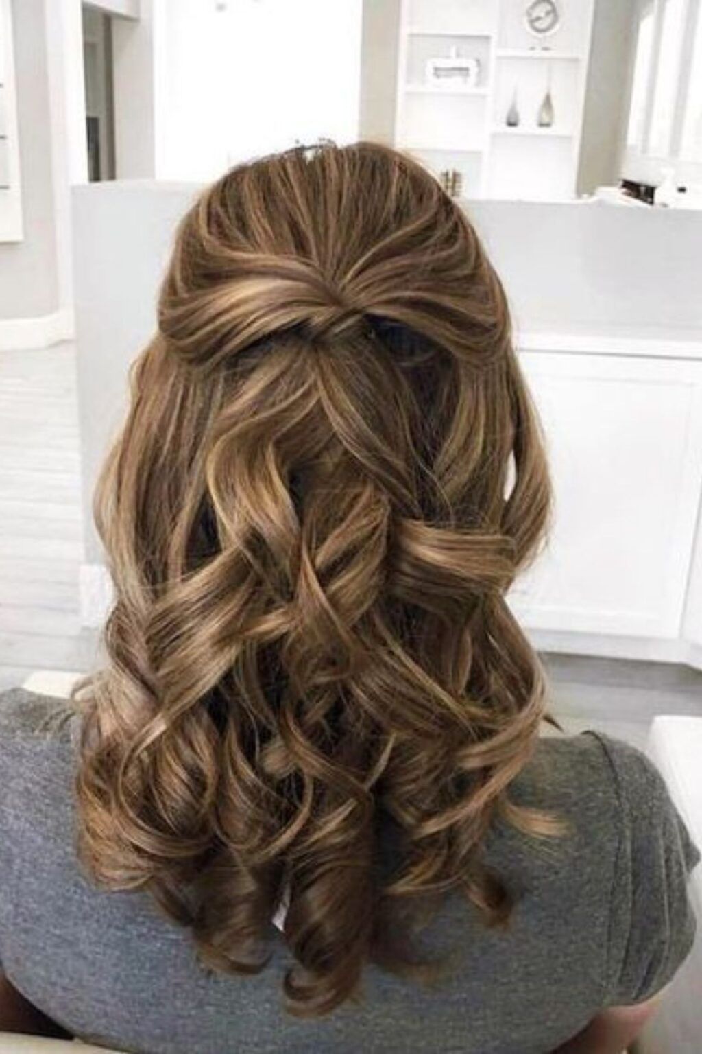 Twisted Knot Half-Up With Defined Curls Twisted Knot Half-Up With Defined Curls — Winter Formal Hairstyles