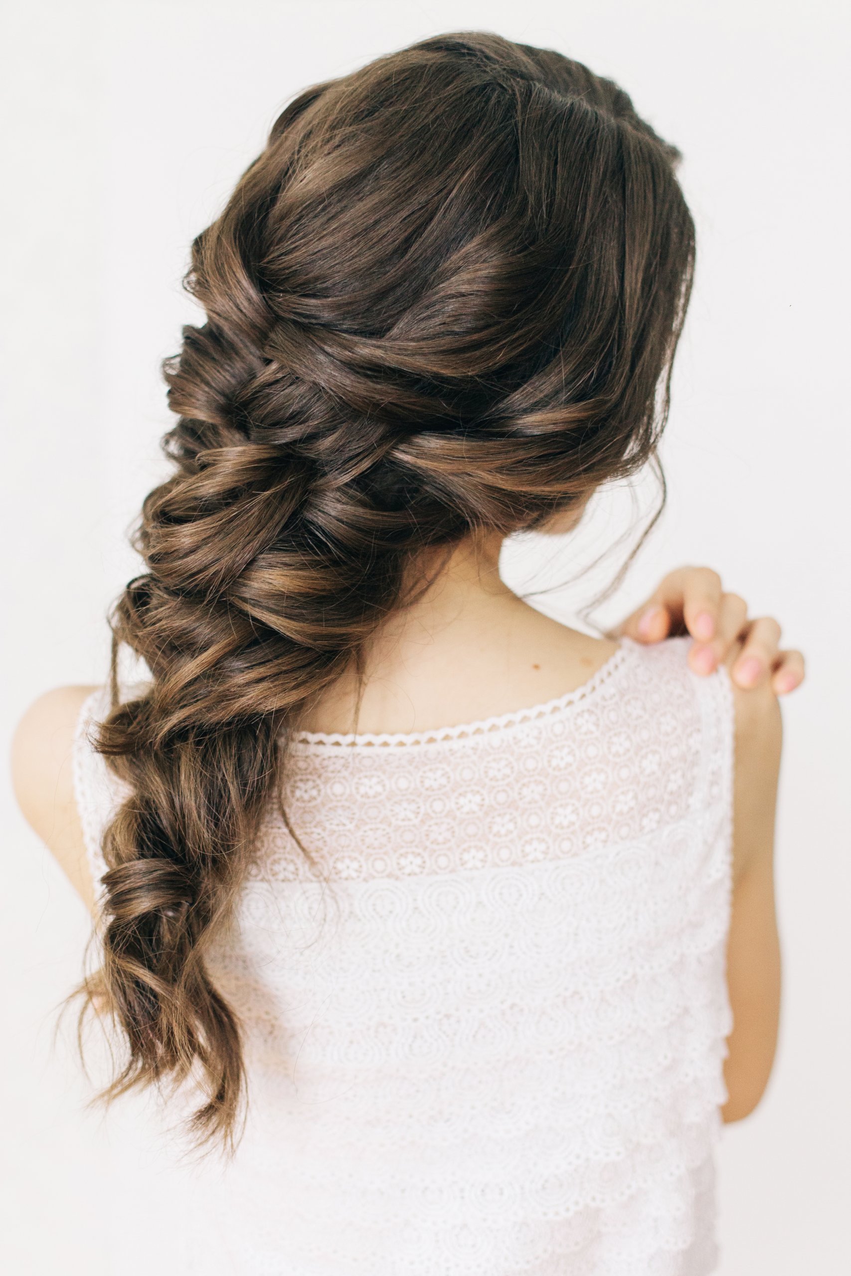 Intricate Medium Brown Side Braid — Winter Wedding Guest Hairstyles