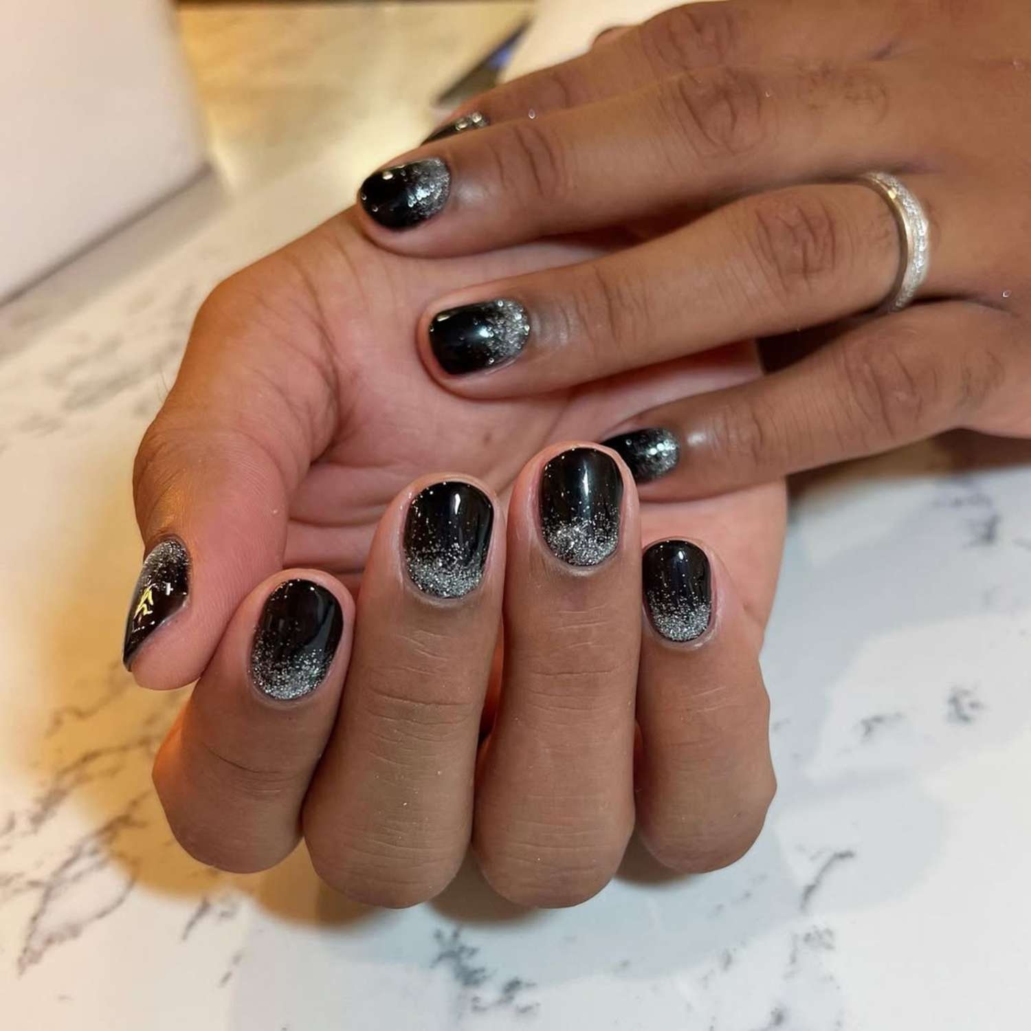 Short Oval Black Silver Glitter Gradient Nails Short Oval Black Silver Glitter Gradient Nails — New Years Eve Nails 2027