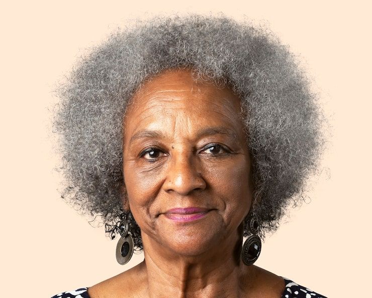 Voluminous Grey Afro Voluminous Grey Afro — Winter Haircuts for Women Over 70