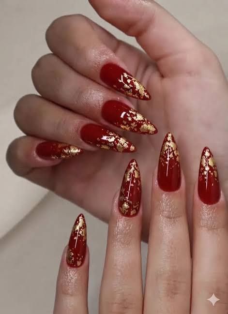 Deep Red Gold Foil Stiletto Nails Deep Red Gold Foil Stiletto Nails — Classy Christmas Nails 2026