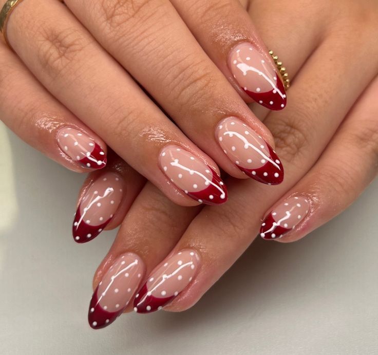 Deep Red French Tips with White Polka Dots Deep Red French Tips with White Polka Dots — Red Christmas Nails 2026