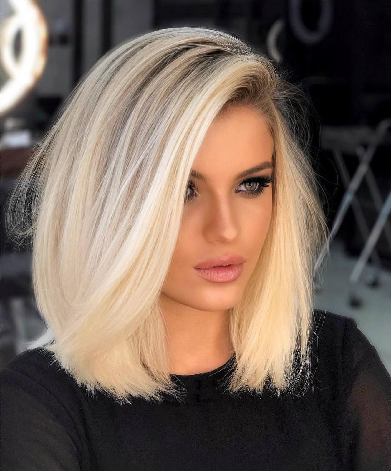 Sleek Chin-Length Platinum Bob — Winter Haircuts for Straight Hair