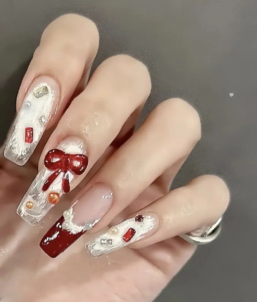 3D Red Bow Textured Christmas Nails 3D Red Bow Textured Christmas Nails — Short Christmas Coffin Nails 2026