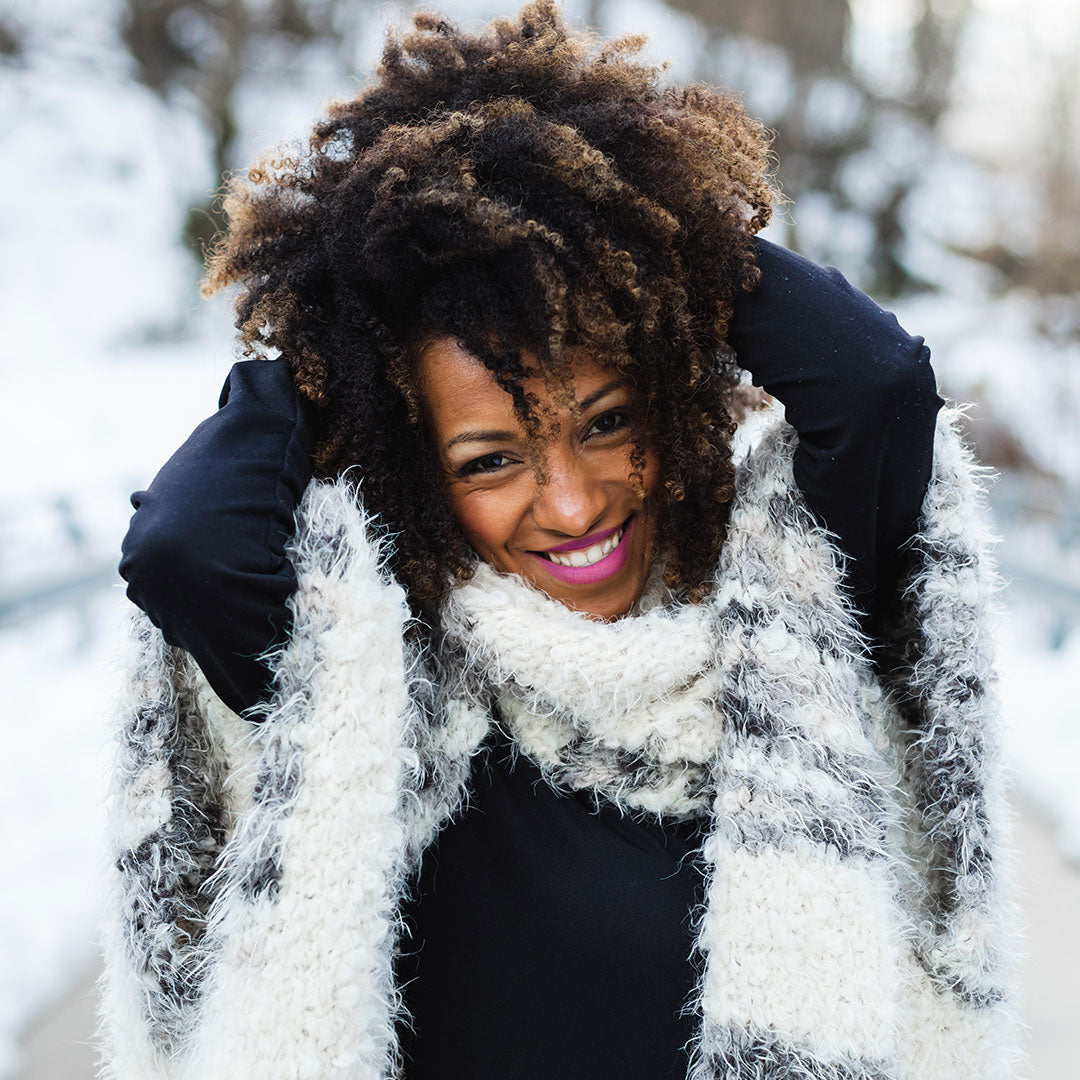 Natural Afro With Subtle Highlights Natural Afro With Subtle Highlights — Winter Haircuts for Black Women