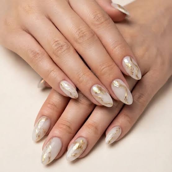 Creamy Off-White with Abstract Gold Foil Creamy Off-White with Abstract Gold Foil — Winter Nail Colors for Women Over 70