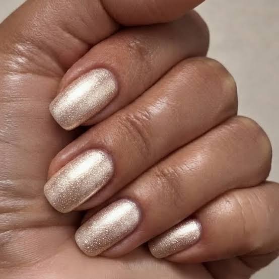 Short Oval Champagne Shimmer Nails Short Oval Champagne Shimmer Nails — New Years Nail Colors 2027
